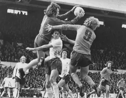 Ron Futcher is beaten to the ball by Tottenham's Pat Jennings