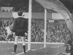 A free kick from Jimmy Ryan hits the back of the net for the first goal