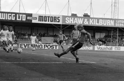Ron Futcher shoots for goal