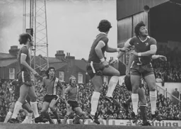 Chelsea's Micky Droy clears the danger