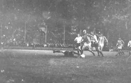 Ron Futcher tries to round the keeper