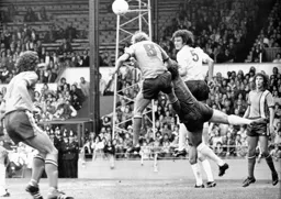 Ron Futcher challenges the goalkeeper