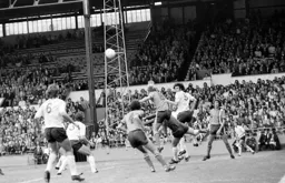 Ron Futcher in a crowded Wanderers box