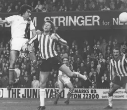 Peter Anderson flashes a header wide
