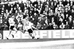 John Aston about to cross