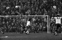 John Faulkner makes sure he clears the ball