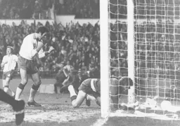 Portsmouth's George Graham looks less than pleased with his goalkeeper following the first goal