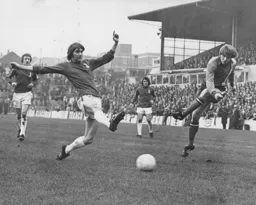 Alan West puts over a cross