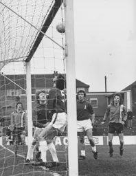 Matt Pollock and Andy King wait in vain for the ball to drop over the line