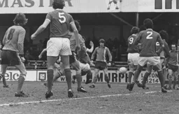 John Ryan (hidden) puts the Town ahead