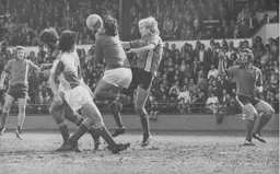 Ron Futcher challenges Rovers goalkeeper Jim Eadie