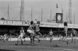 Ron Futcher nearly has his head taken off by Rovers keeper