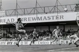 John Aston chips the keeper