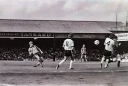Alan West crosses into the box