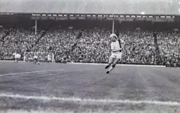 Ron Futcher on his own down the wing