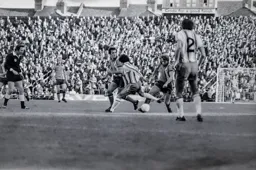 Alan West battles in midfield