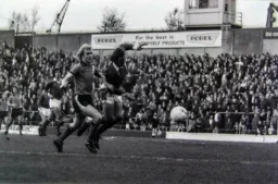 Ron Futcher seems to have the better of Barry Kitchener