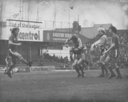 Alan West and Ron Futcher attack the Cardiff goal