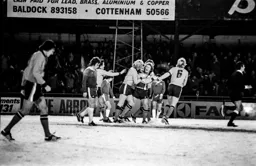 Jimmy Husband mobbed after scoring the third