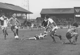 Ron Futcher skips through the Rovers defence