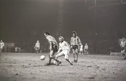 John Aston controls the ball