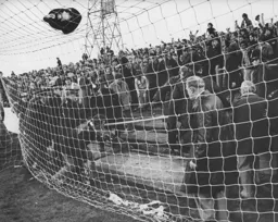 A wall collapses behind the goal
