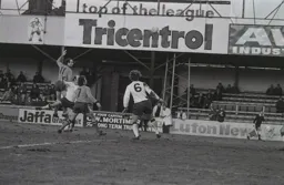 John Aston heads towards goal