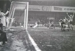 David Geddis on the floor after scoring his first goal for Luton