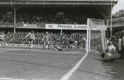 Ron Futcher sees his effort stopped on the line by Saints Peter Rodrigues