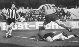 Phil Boersma hurdles the Notts goalkeeper before scoring goal number two