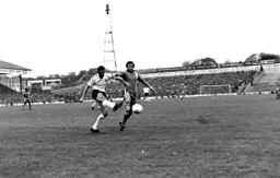 Dixie Deans wins the ball