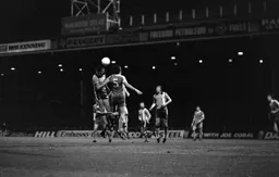 Paul Price leaps with the City centre half