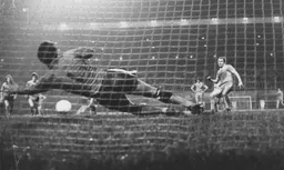 Milija Aleksic cannnot prevent City's Dennis Tueart netting from the spot