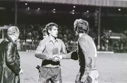 Milija Aleksic shakes hands with Joe Corrigan at the end of the game