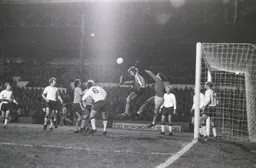 Paul Price tangles with the keeper