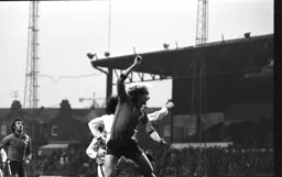 Ron Futcher gets a header in
