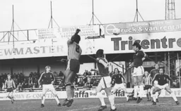 Ricky Hill heads across goal
