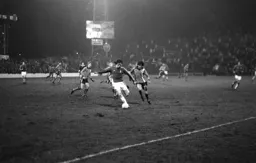 Phil Boersma harries an Athletic defender