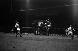 Brian Stein challenges the keeper