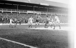 Ron Futcher watches his header rise over the bar