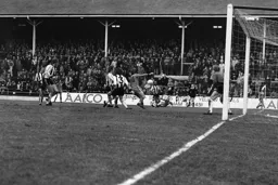 Graham Jones tries to get onto the ball from a Ron Futcher cross