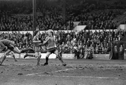 Ron Futcher beaten to the ball by the keeper