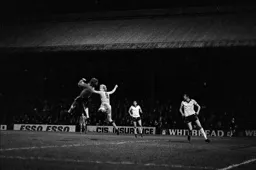 Ron Futcher is beaten to the ball by the keeper