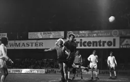 Ron Futcher attempts to get to the ball before the keeper