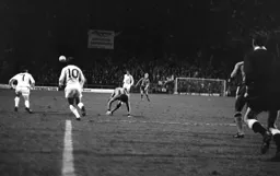 Phil Boersma loses out to the Wanderers midfield