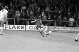 Mark Aizlewood clears the ball