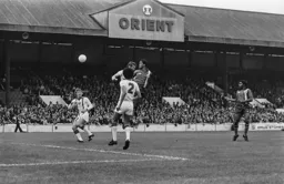 Brian Stein heads for goal
