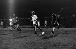 Phil Parkes gathers the ball before Bob Hatton