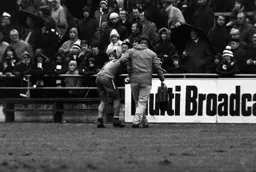 Barry Silkman helped off