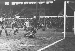 Ricky Hill's late effort is on its way into the back of the net